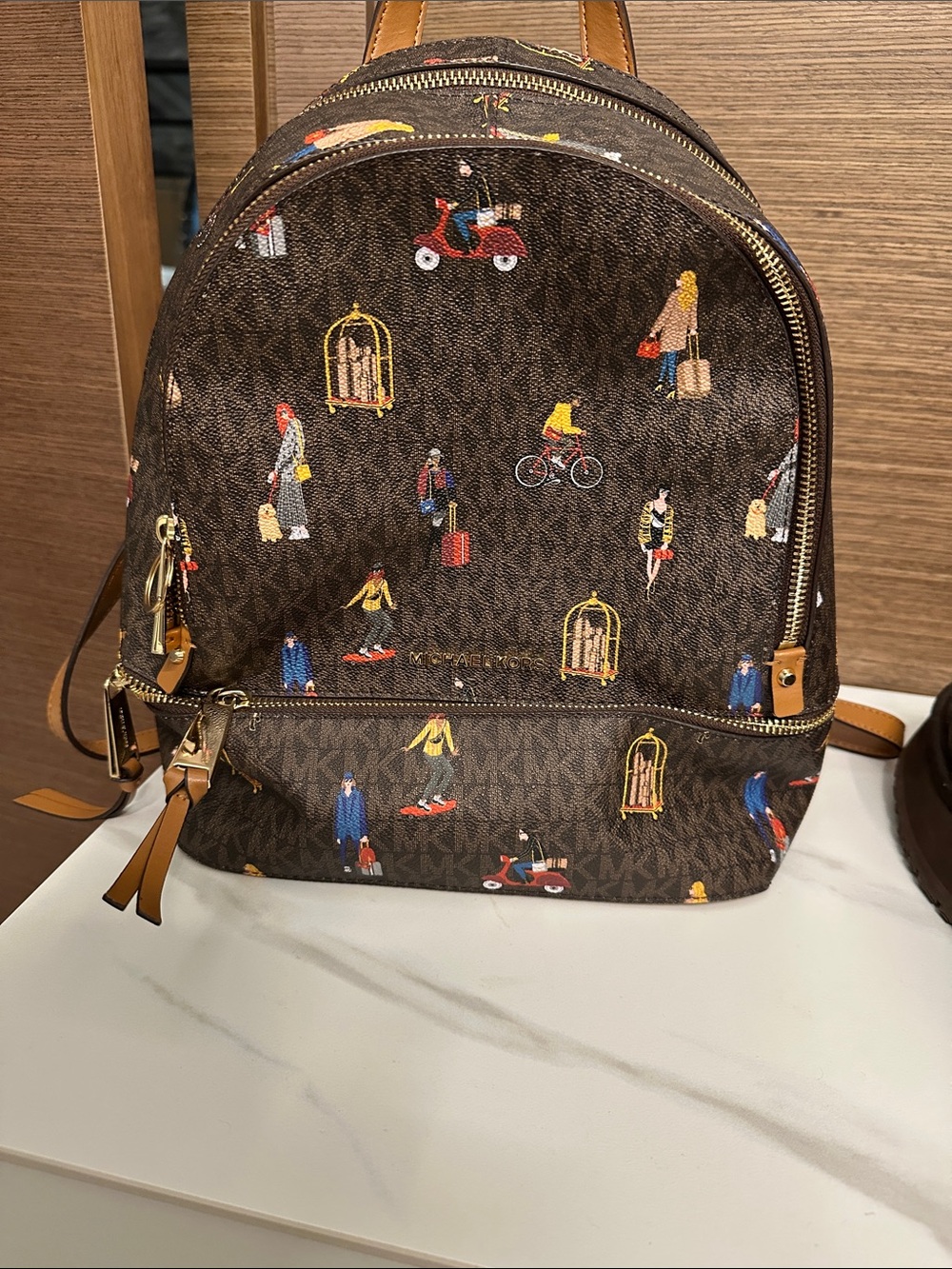 Michael Kors Brown Logo Canvas Backpack with Multi-Color Travel Print